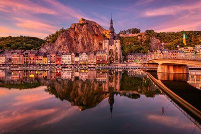 Wallonie photo locations - Dinant reflection on the Meuse river at twilight 