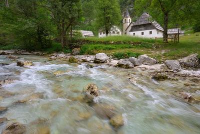 photo spots in Soča River Valley - Soča River and Church in Trenta Valley