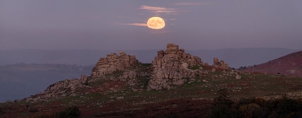 A view to Hound Tor, looking east, during a moonrise (during a mirage)