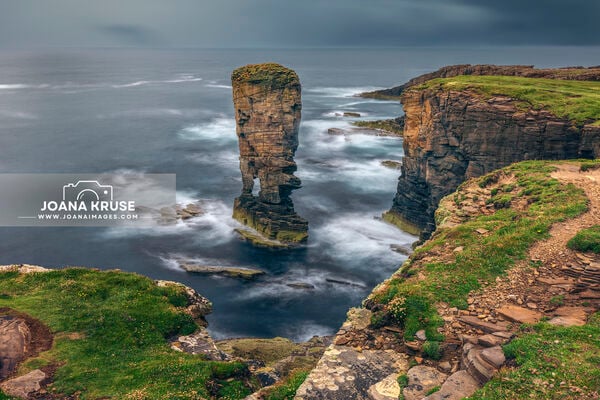 Yesnaby Castle is a famous two-legged sea stack near Sandwick on the Mainland in Orkney, Scotland.