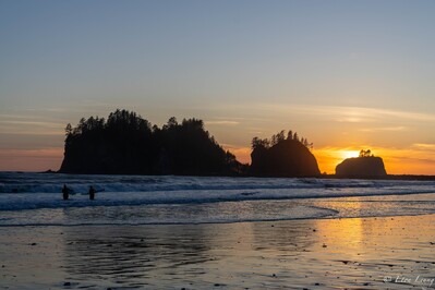 Sunset at 1st Beach, La Push, WA, with couple of surfers.