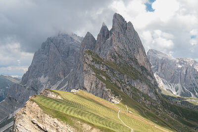The Dolomites in N. Italy is a place everyone should visit.  You can hike or reach the top by cable cars and ski lifts.